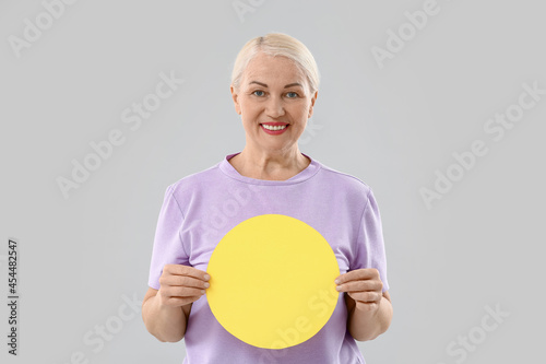 Mature woman with blank pap...