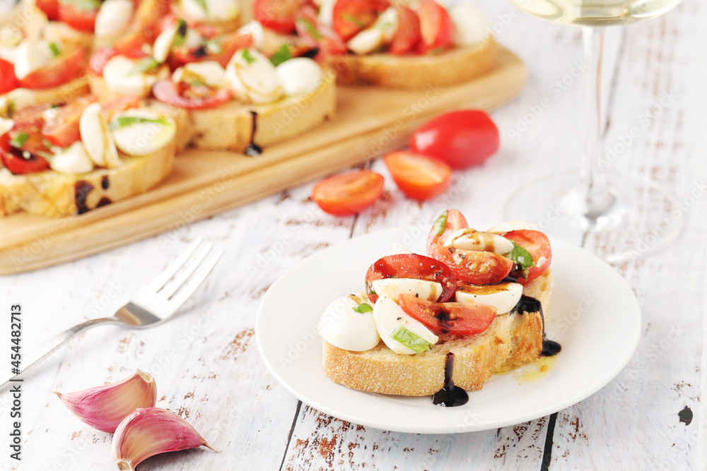 Italian bruschetta with tomatoes and mozzarella Italian bruschetta with tomatoes and mozzarella