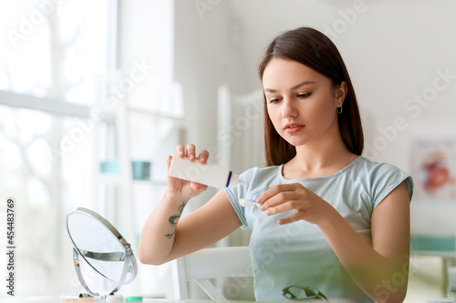 Young woman with contact le...