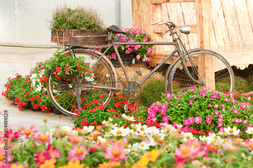 Old bike and decorated with flowers.
