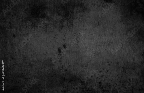 Dark concrete floor or old grunge background. Rough Black wall slate texture rough background.