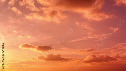 Time lapse of sunrise in bright colors. Amazing sky scape with clouds and sunbeams. Beginning of new day. From dark to light.
