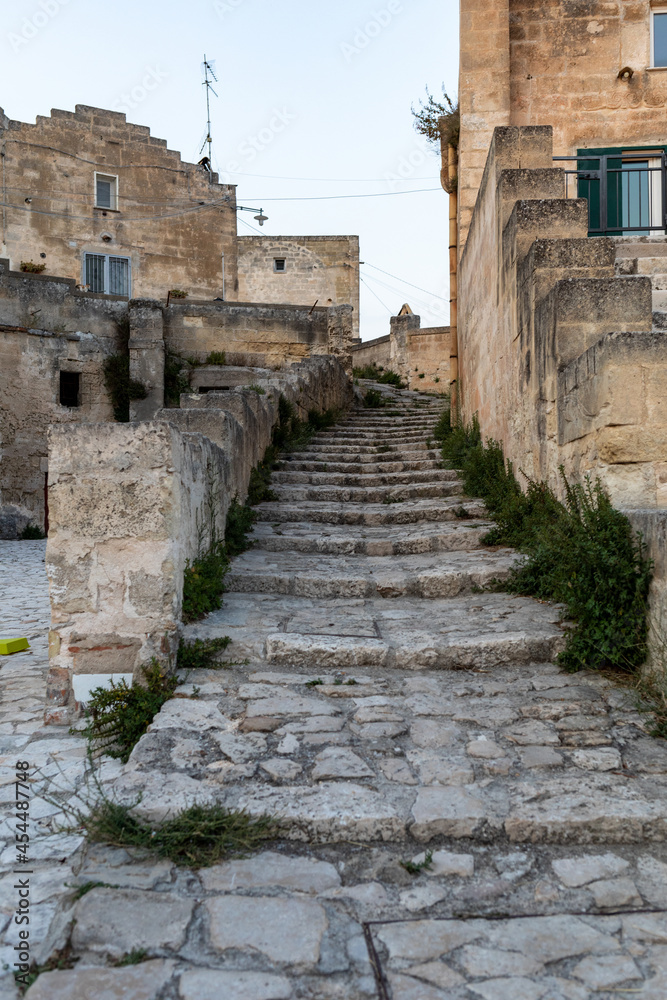  Typical cobbled stairs in a side street alleyway iin the Sassi di Matera a historic district in the city of Matera. Basilicata. Italy