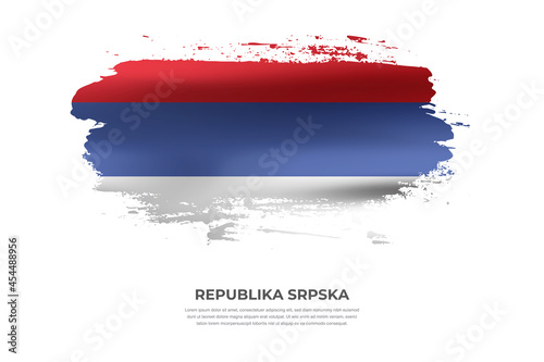 Artistic folded brush flag of Republika Srpska. Paint smears brush stroke flag on isolated white background photo