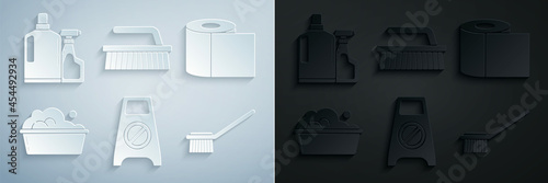 Set Wet floor and cleaning in progress, Toilet paper roll, Plastic basin with soap suds, brush, Brush for and bottles liquid dishwashing liquid icon. Vector