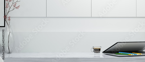 Space for your product mockup on white tabletop with laptop, white background, 3d rendering © bongkarn