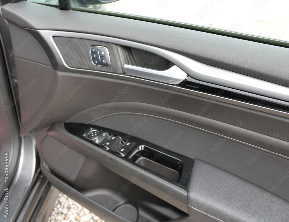 Car handle handle with adjustment knob.