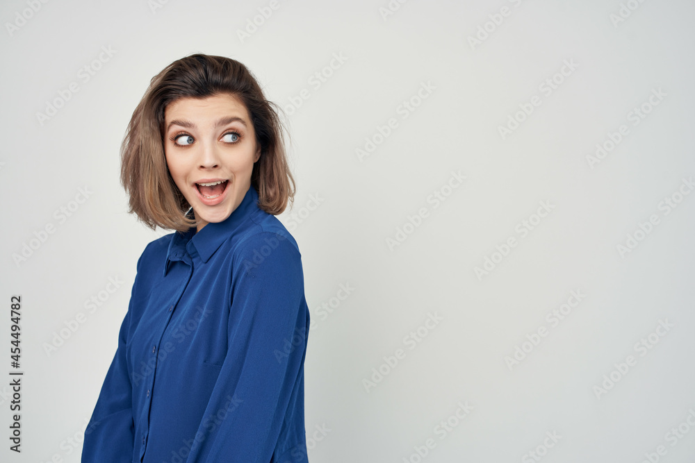 woman in blue shirt fashion posing elegant style woman in blue shirt fashion posing elegant style