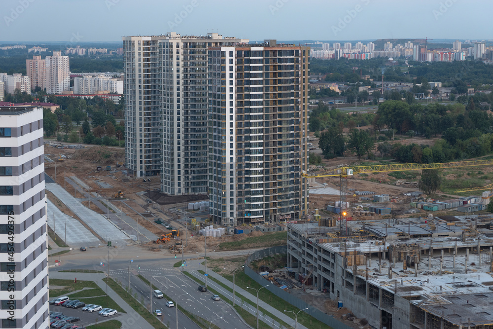 Fototapeta premium construction of a house in a new district of Minsk