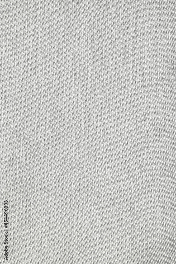 The texture of uneven natural cotton gray with white fabric, abstract textile background. The texture of uneven natural cotton gray with white fabric, abstract textile background.