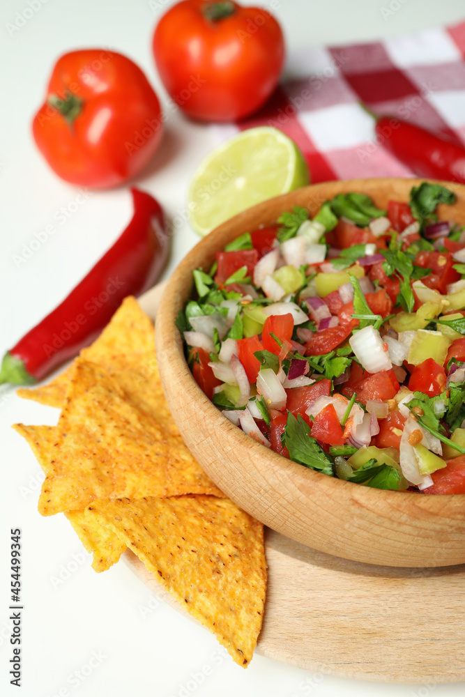 Mexican food concept with Pico de Gallo on white background Mexican food concept with Pico de Gallo on white background