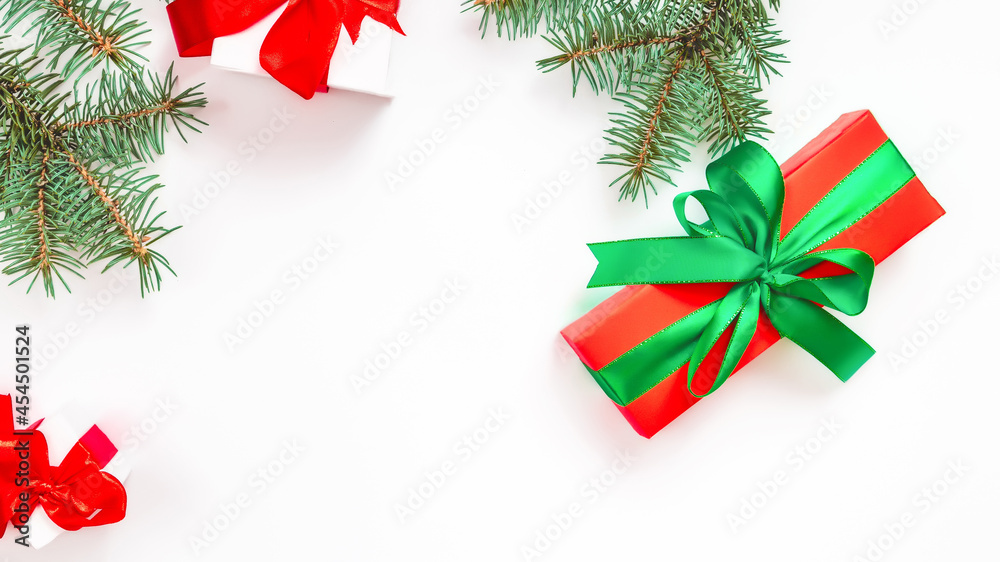 Flat lay composition with gift boxes and Christmas decorations on white table, space for text Flat lay composition with gift boxes and Christmas decorations on white table, space for text