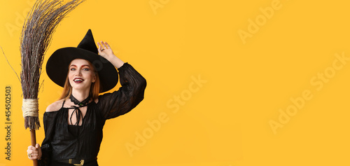 Beautiful woman dressed as witch for Halloween on color background © Pixel-Shot