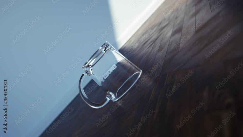 Falling Mug Empty Glass Mug Falling and Spinning on Wooden Floor with 'Be Strong' Text ...