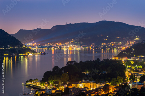 Panorama on lake Como and cernobbio, observing the city from afar, on a summer night. 