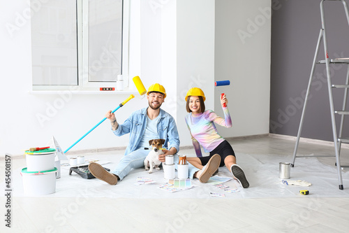 Happy young couple with cut...