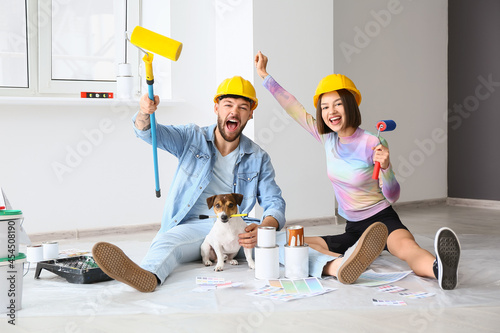 Happy young couple with cut...