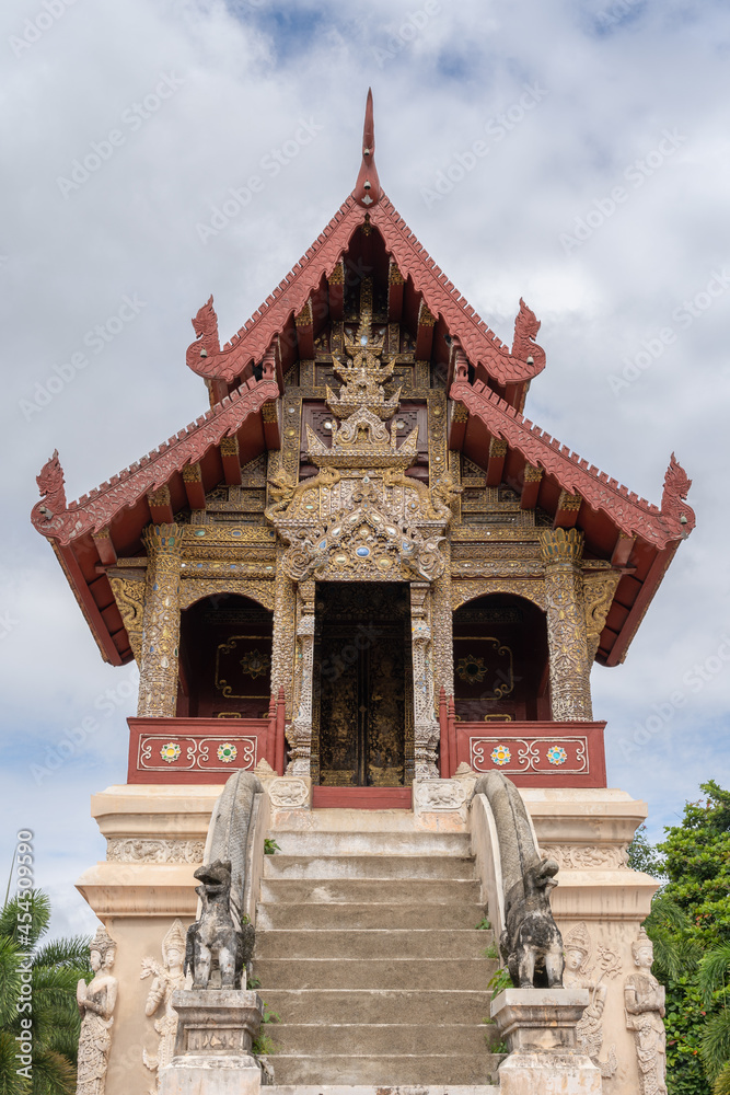 Vertical view of the facade of ancient Hor Trai library at famous landmark Wat Phra Singh buddhist temple, Chiang Mai, Thailand