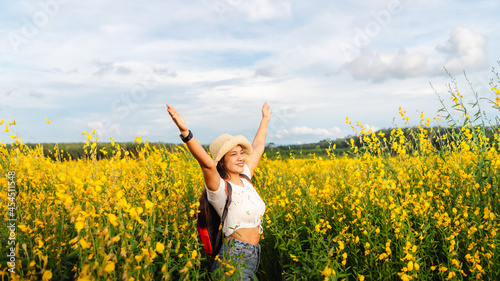 Panorama freedom lifestyle traveler woman arm up joy fun beautiful nature view scenic landscape yellow flower blooming, Outdoor active tourism travel Thailand summer vacation, Blossom floral in Asia