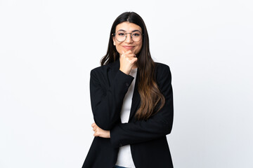 Business woman over isolated white background laughing