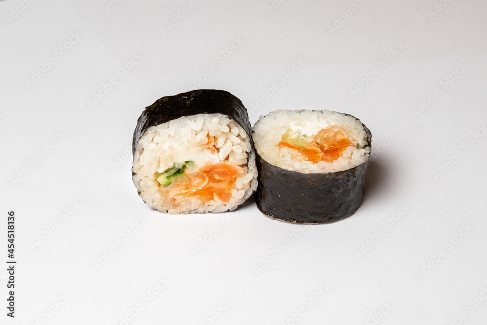 Traditional japanese nigiri sushi, separated on white background, side view Traditional japanese nigiri sushi, separated on white background, side view