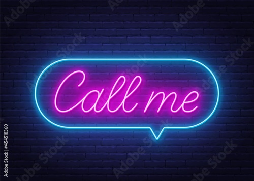 Call Me neon sign in the speech bubble on brick wall background.