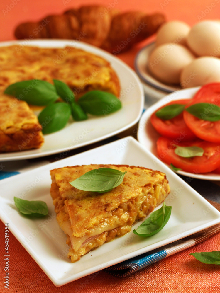 Croissannt omelette stuffed with cheese and ham.