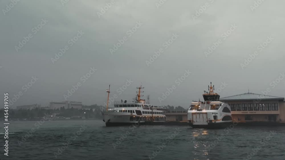 Ferry ships on pier in Isanbul. Traditional Turkish water transport for tourists and local residents to travel between islands in Sea of Marmara and Black Sea through Straight of Istanbul Bosphorus Ferry ships on pier in Isanbul. Traditional Turkish water transport for tourists and local residents to travel between islands in Sea of Marmara and Black Sea through Straight of Istanbul Bosphorus