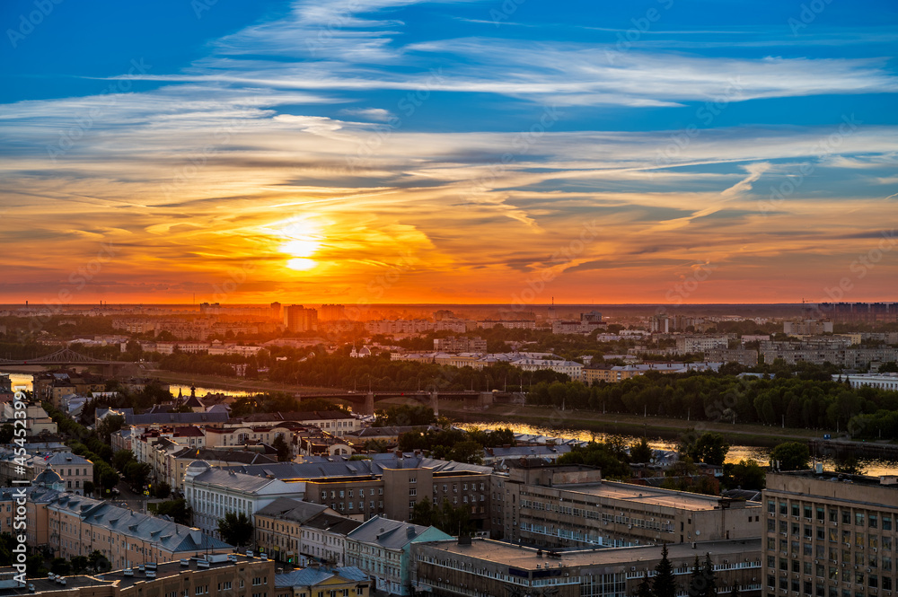 Sunset over the Russian city of Tver and the Volga river. All brand names and logo removed from buildings