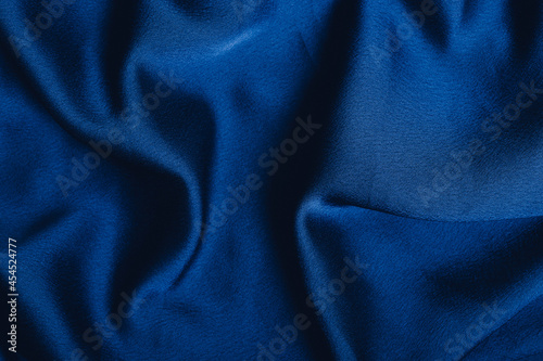 Dark blue fabric laid in soft folds