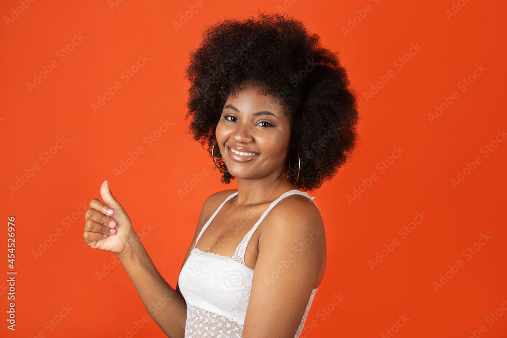 young african joyful woman with hand gesture young african joyful woman with hand gesture