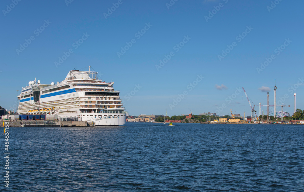 Skyline view and cruise ship of the Stockholm harbor.
