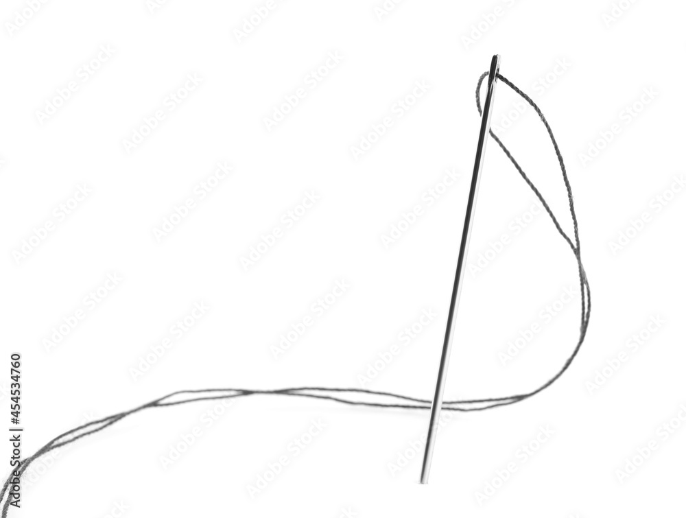 Sewing needle with thread on white background Sewing needle with thread on white background