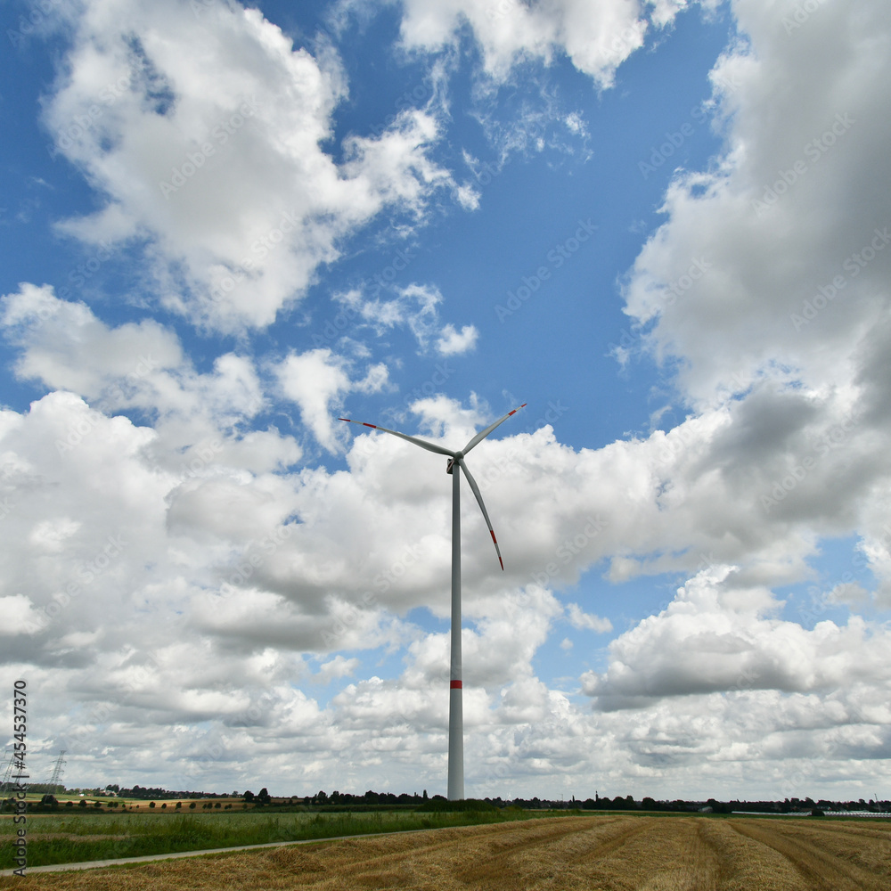 Gigantic electric wind turbine in the middle of the fields in Flanders near tongeren. Gigantic electric wind turbine in the middle of the fields in Flanders near tongeren.