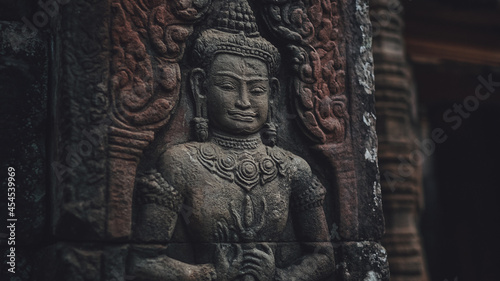 Closeup of a statue inside the Banteay Kdei temple.  Angkor, Cambodia. photo