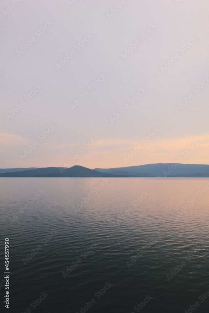 Evening landscape with mountains with blue sky over lake Turgoyak in the Chelyabinsk region