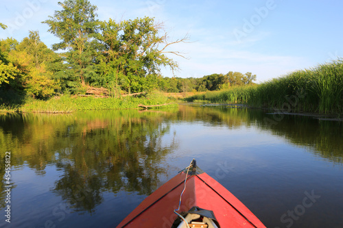 red kayak float on lake water