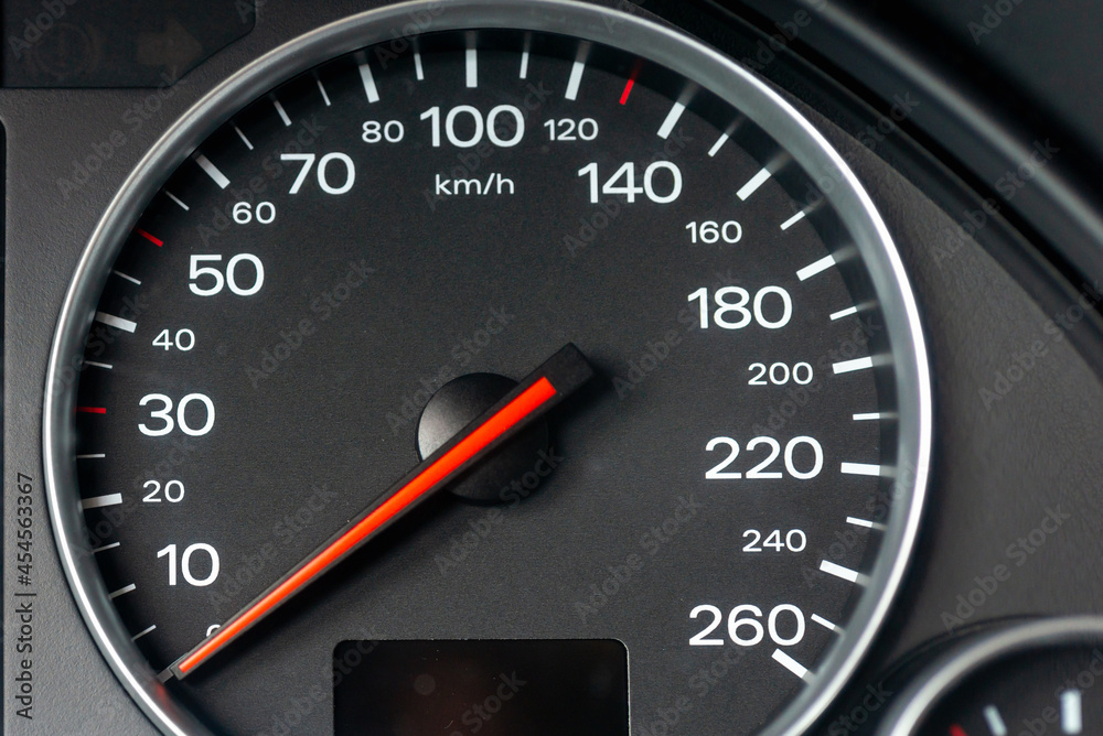 Speedometer in a car. Car dashboard. Dashboard details with indication lamps.Car instrument panel. Dashboard with speedometer, tachometer, odometer. Car detailing. Modern interior.Closeup shot. Speedometer in a car. Car dashboard. Dashboard details with indication lamps.Car instrument panel. Dashboard with speedometer, tachometer, odometer. Car detailing. Modern interior.Closeup shot.