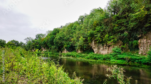Limestone cliffs near pond at Creswell Crags. 