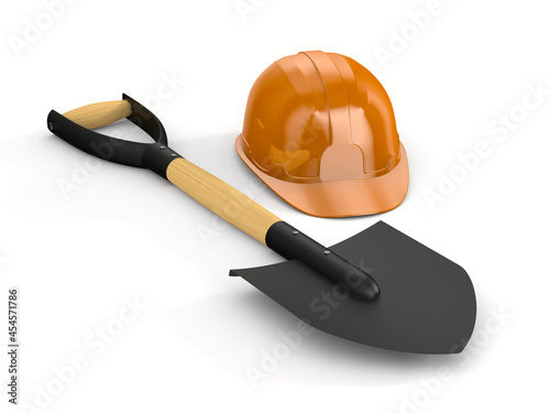 orange hard hat and shovel ...