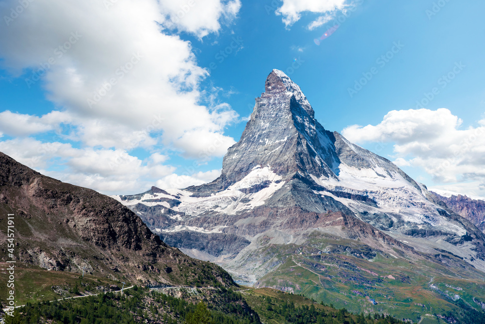 Fascinating landscape with  with the top of the mountain Matterhorn in the clouds in the Swiss Alps, near Zermatt, Switzerland