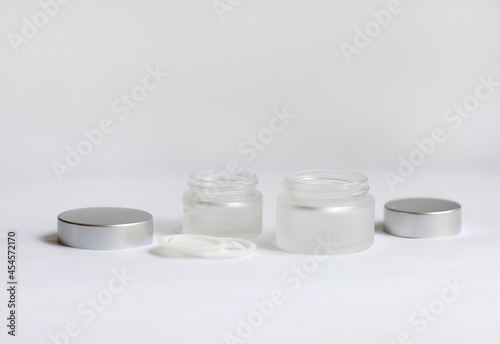 jar of cream on a white background
