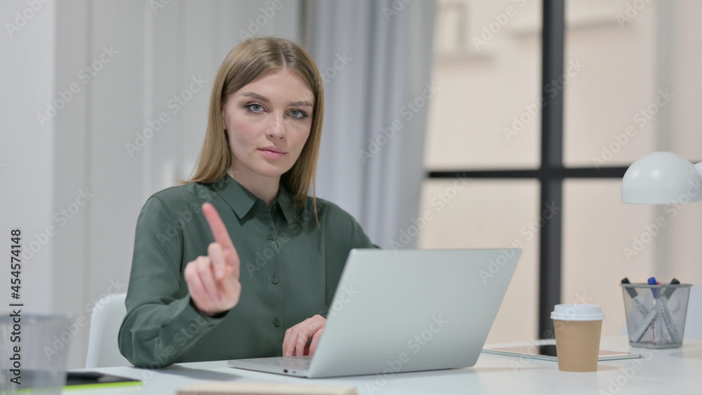 No Gesture with Finger by Young Woman at Work No Gesture with Finger by Young Woman at Work