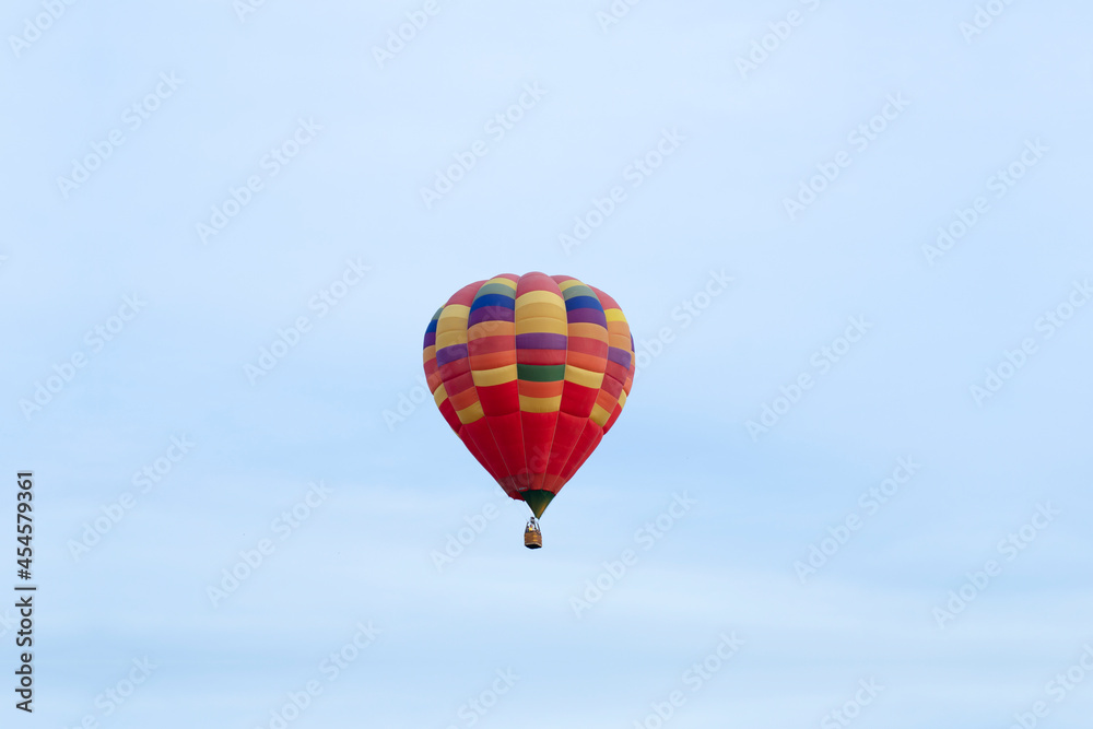 Aerostat. Big balloon. In the blue sky. Red. Aerostat. Big balloon. In the blue sky. Red.
