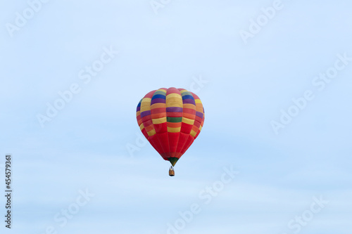 Aerostat. Big balloon. In the blue sky. Red.