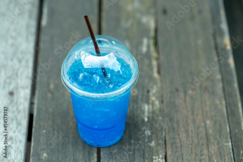 Blue Italian soda on wooden table