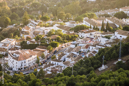 Beautiful aerial view of streets and house in Mijas Pueblo, a Spanish village at sunset