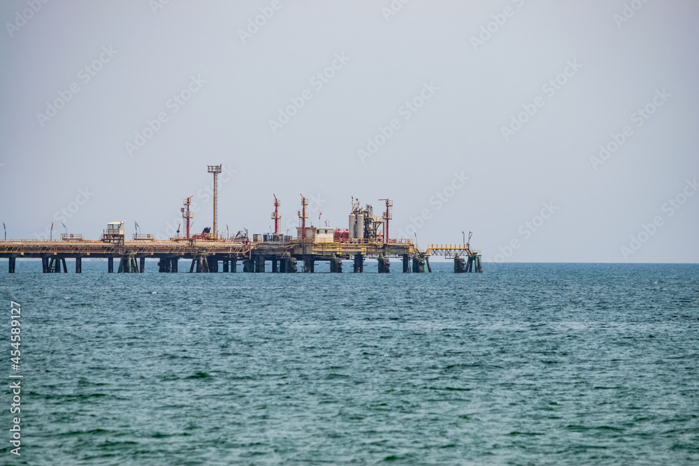 View of an oil pipeline and a dock for oil tankers.