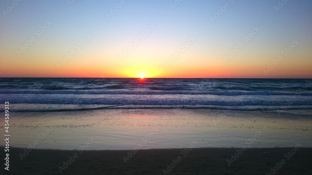 Colourful sunrise over the beach on Canary islands Colourful sunrise over the beach on Canary islands