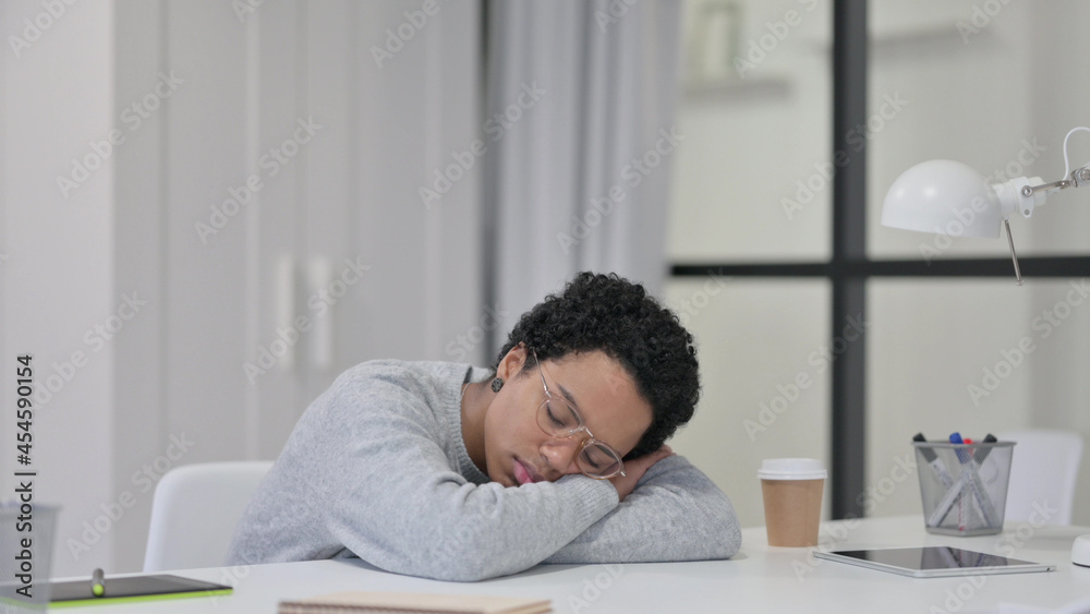 Sleepy African Woman Taking Nap at Work Sleepy African Woman Taking Nap at Work